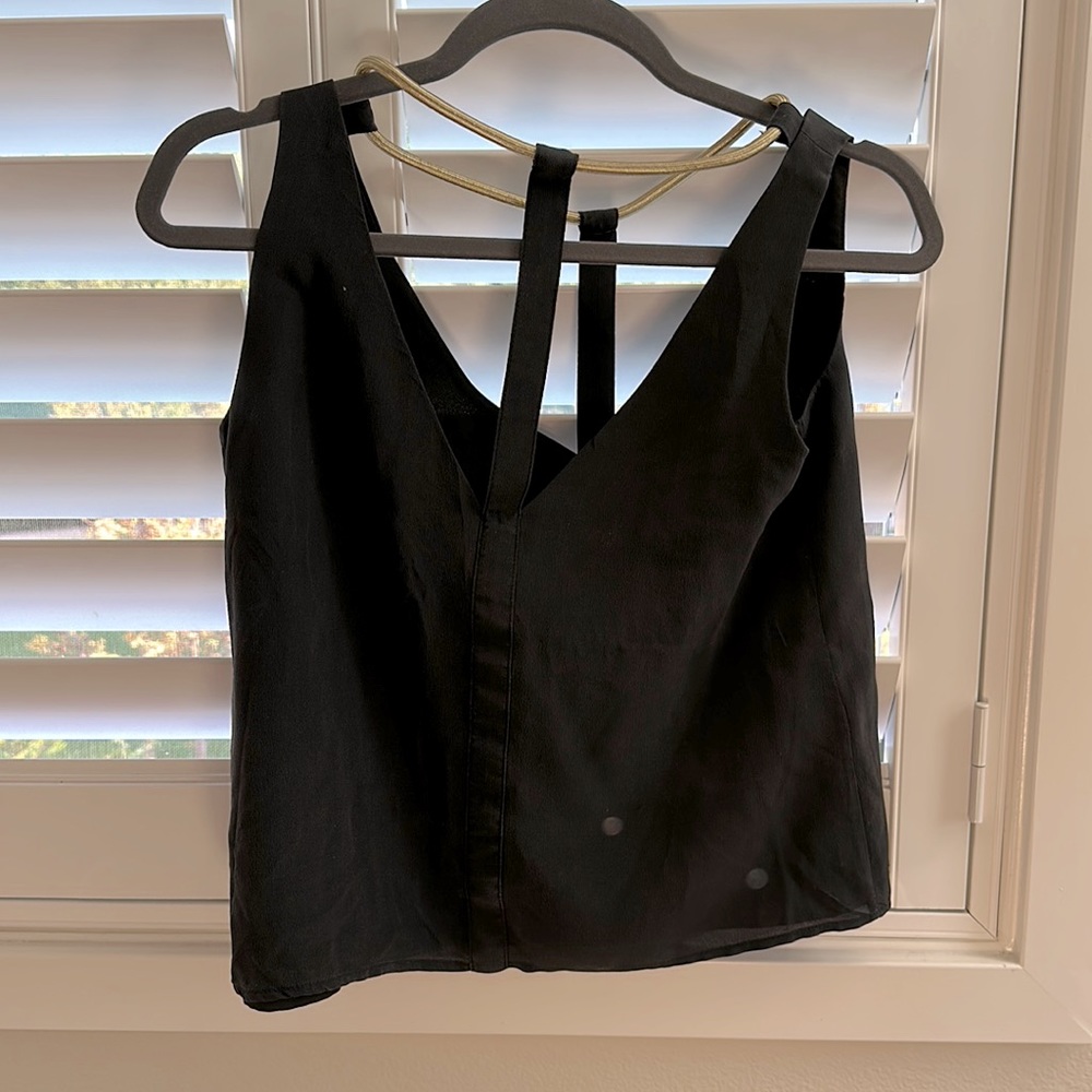 Bcbg cutout black blouse with gold neckline